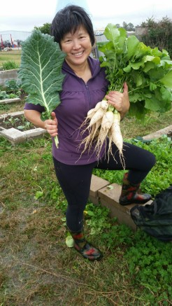 Siok Hong Chen-Sabot shows off her giant radishes